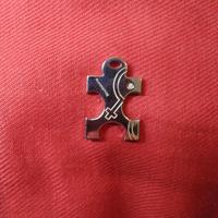 Ciondolo pezzo di puzzle Nomination