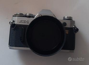 Fotocamera Canon AE-1 con 2 teleobiettivi