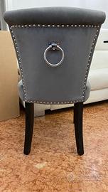 Sedie Positano grigie in velluto con borchie