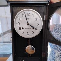 Orologio pendolo stile vintage