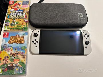 NINTENDO SWITCH OLED + 2 GIOCHI