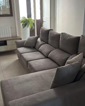 Divano con penisola e contenitore