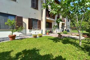 APPARTAMENTO CON TAVERNA E GIARDINO