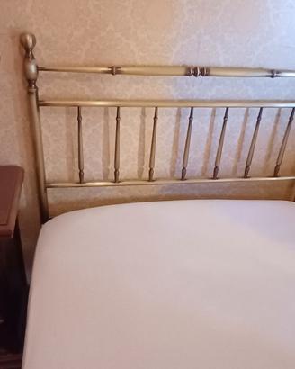 camera da letto in ottone