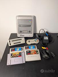Nintendo snes + 4 giochi  + adattatore ntsc