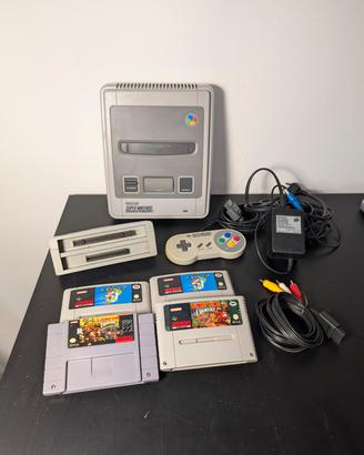 Nintendo snes + 4 giochi  + adattatore ntsc