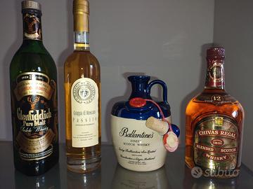 Bottiglie whisky e grappa