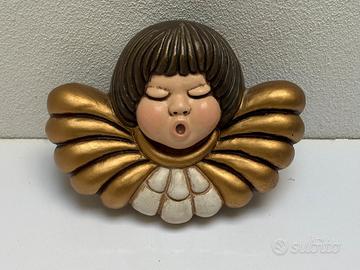 testa d' angelo Thun 