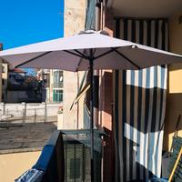 Ombrellone con piantana in pietra