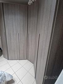 camera da letto con armadio angolare a 6 ante