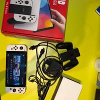 Nintendo switch oled TRATTABILI+ 2 giochi