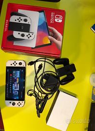 Nintendo switch oled TRATTABILI+ 2 giochi