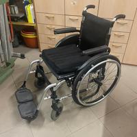 Carrozzina pieghevole PROGEO con cuscino