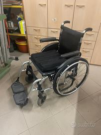 Carrozzina pieghevole PROGEO con cuscino