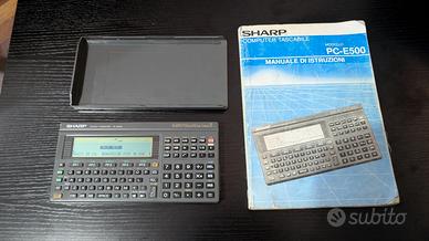 Sharp PC-E500 Pocket Computer anni '90 con manuale
