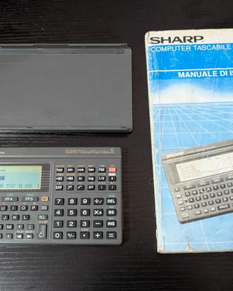 Sharp PC-E500 Pocket Computer anni '90 con manuale