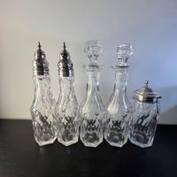 Oliera vittoriana in argento a cinque bottiglie.