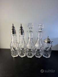 Oliera vittoriana in argento a cinque bottiglie.