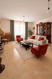 Casa con giardino