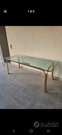 Tavolo in vetro con gambe tubolari