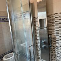 Box doccia con accessori