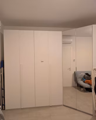 Armadio angolare con angolo cabina armadio