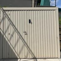 Porta basculante con passo d’uomo