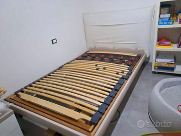 Letto una piazza e mezzo con comodino e rete