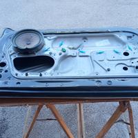 Volkswagen New Beatle cabrio portiera lato guida