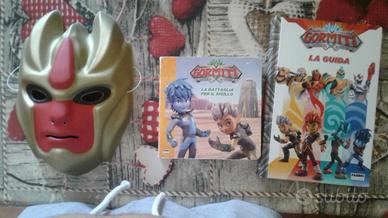 Maschera e 2 libri gormiti