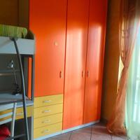 Cameretta bambini componibile in legno semi-nuova.