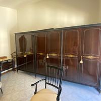 Camera da letto in legno e marmo