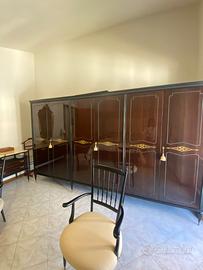 Camera da letto in legno e marmo