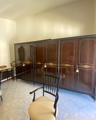 Camera da letto in legno e marmo