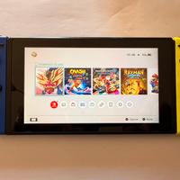 Nintendo Switch + Bundle 7 giochi (Crash,Rayman)