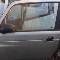 Porta anteriore sinistra Ssangyong Korando 2004