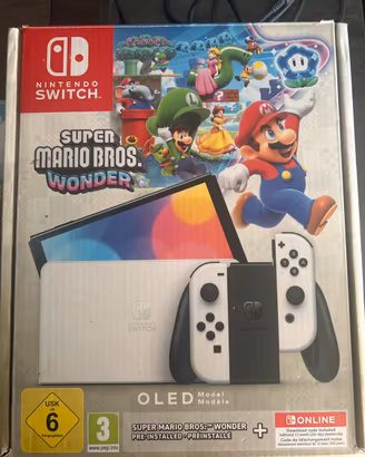 Nintendo Switch OLED + 3 giochi