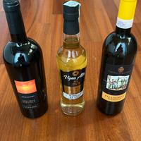 3 bottiglie -2 vino - 1 grappa
