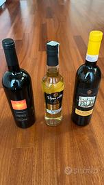 3 bottiglie -2 vino - 1 grappa