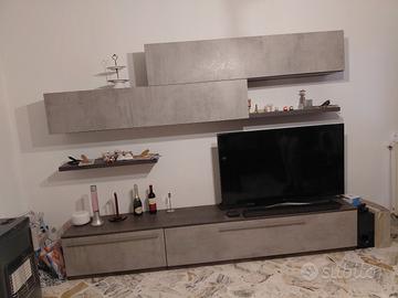 parete attrezzata e letto piazza e mezza