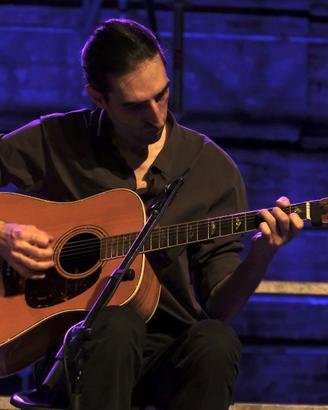 Lezioni di chitarra acustica, basso, mandolino