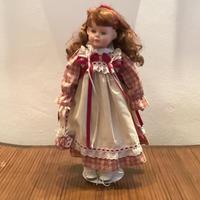 Bambola in porcellana