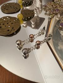 Orecchini  – design Guess