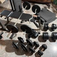 Panca palestra + 150 kg pesi + bilancieri + altro