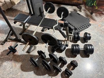 Panca palestra + 150 kg pesi + bilancieri + altro