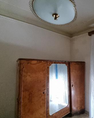 Mobili camera da letto in radica.