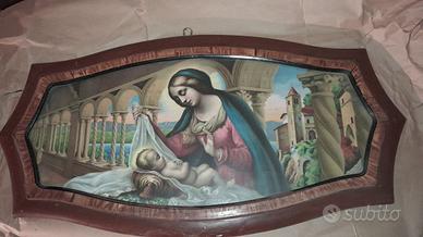 Antico capezzale raffigurante Madonna con Bambino