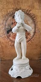 statuina in porcellana 