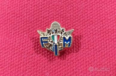 Pins FIM Colore oro scritta blu Logo Federazione M