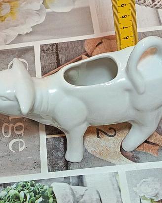 Lattiera vintage a forma di mucca.